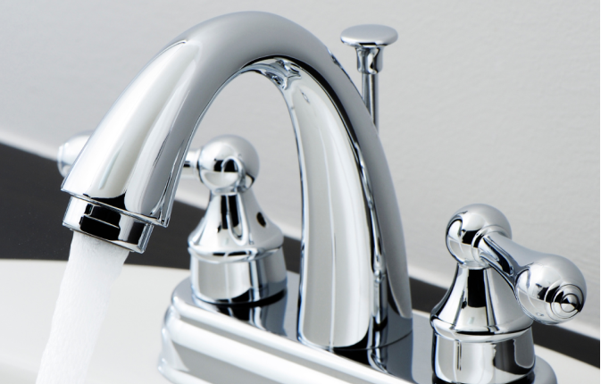 A picture of a running faucet. Faucet Repair and Installation Services in The Delaware County, PA