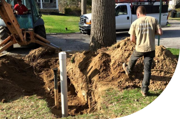 A professional of Antrim Plumbing installing an underground water line piping system, Main Water Line Repair Services Delaware County, PA