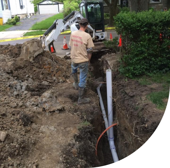 A professional from Antrim Plumbing doing sewer repair service, Sewer Repair Services in Delaware County, PA