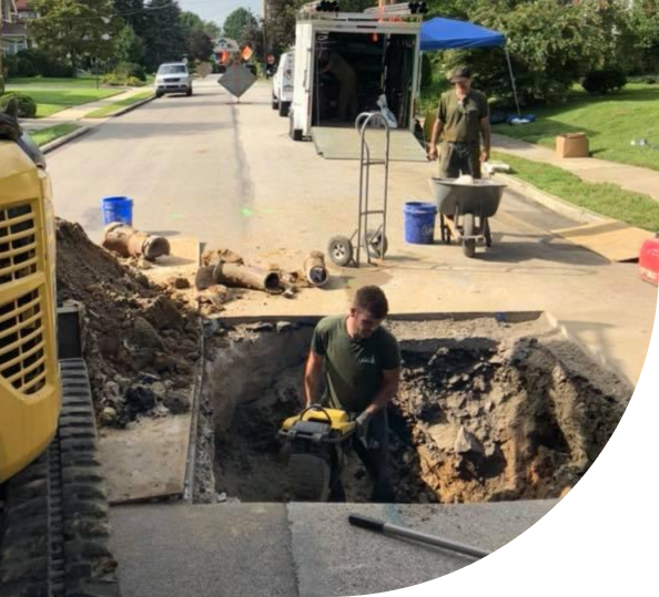 Professionals from Antrim Plumbing replacing a busted sewer system, Sewer Replacement Services in The Delaware County, PA