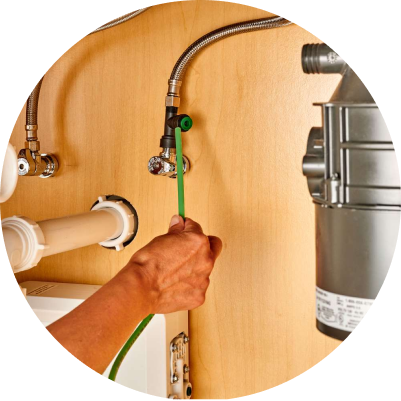 A man installing a reverse osmosis filter system, Reverse Osmosis Installation in Delaware County, PA