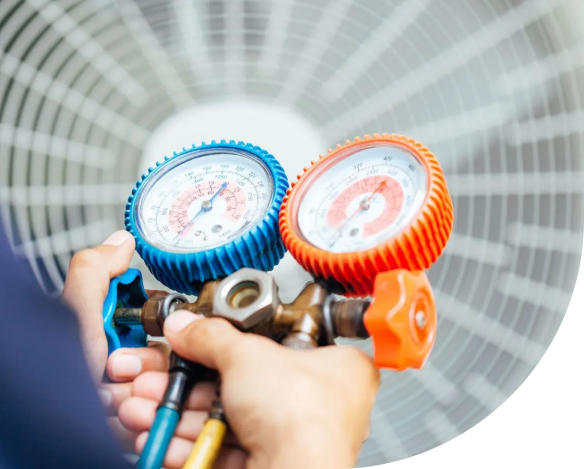 A man performing an Air Conditioning Tune-Up Service in Delaware County.