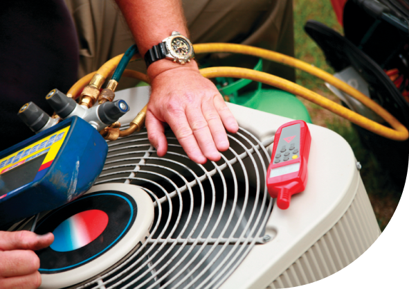 A man doing maintenance work on a heating device., Heating Maintenance Services in Delaware County, PA